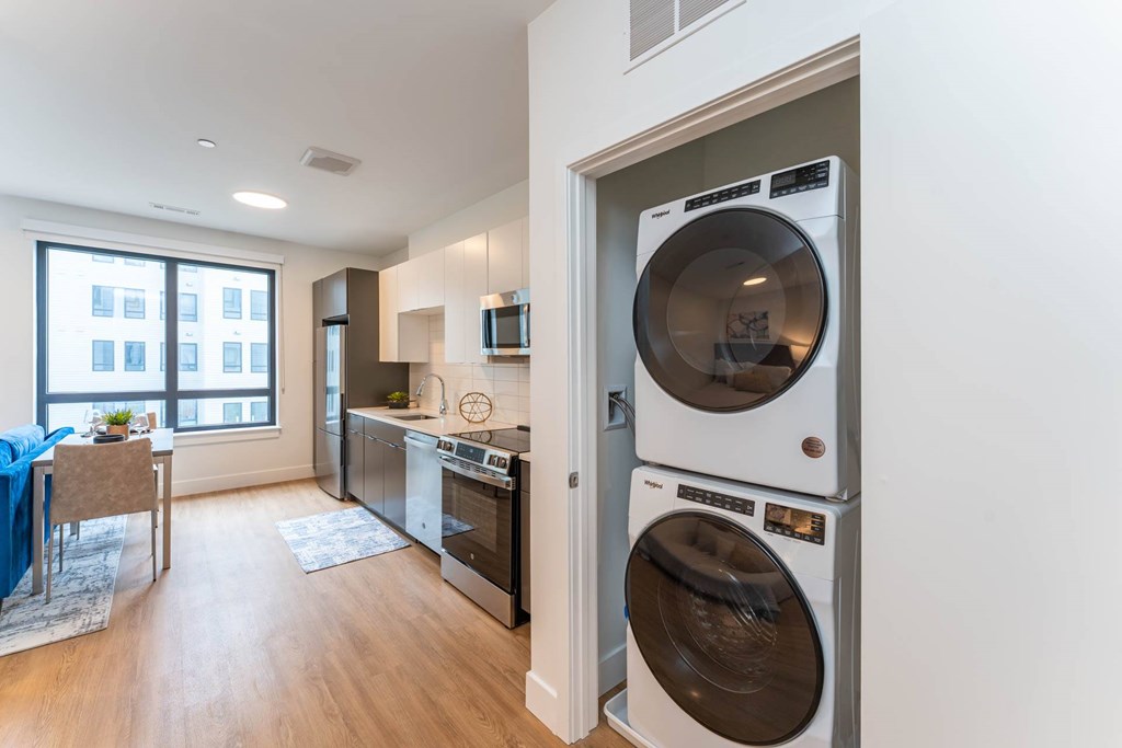 Studio apartment with in home washer and dryer and stainless steel appliances