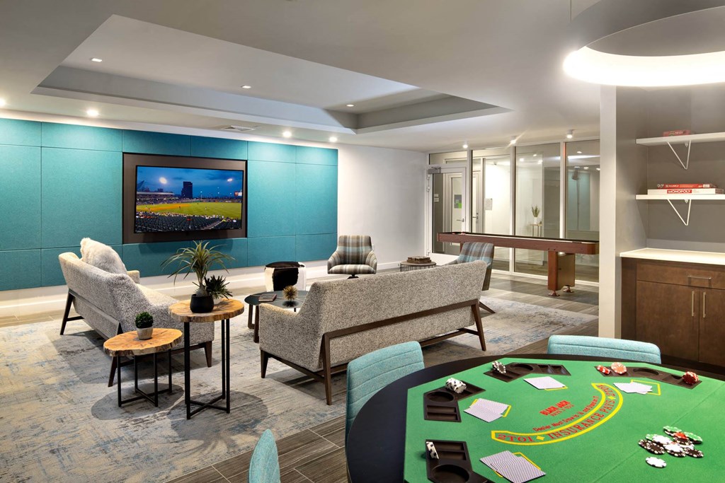 a room filled with furniture and a flat screen tv