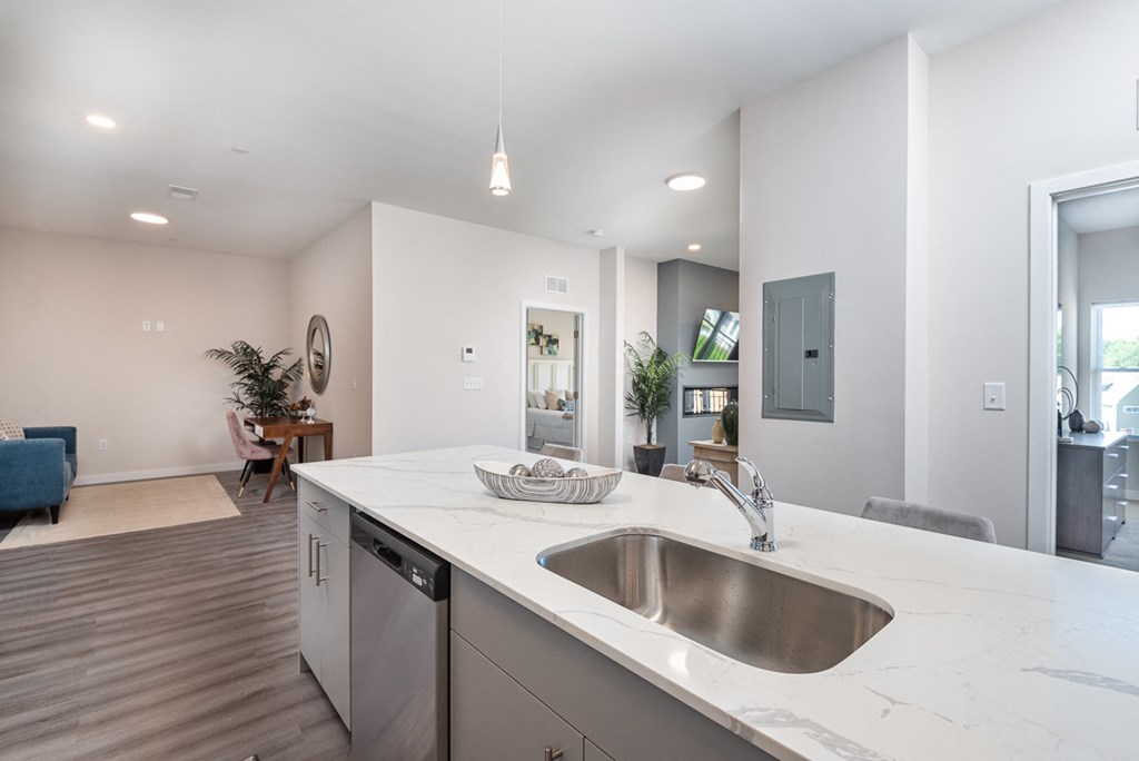 Millside kitchen granite countertops stainless appliances oven range microwave bright finishes