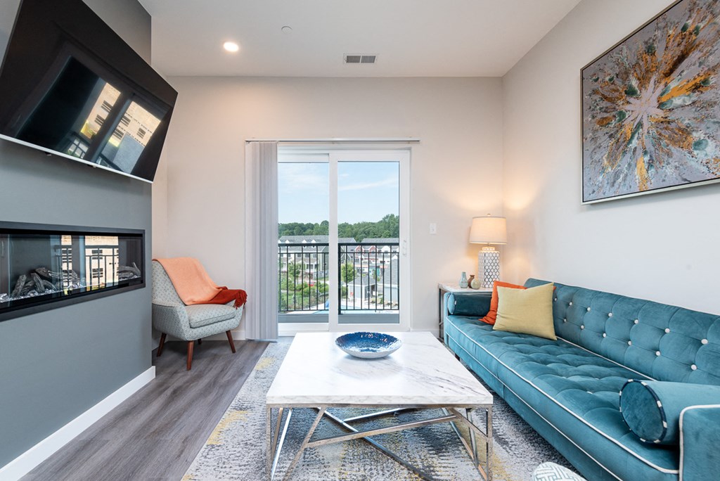 Millside living room model open floor plan balcony and wood finish flooring wide plank