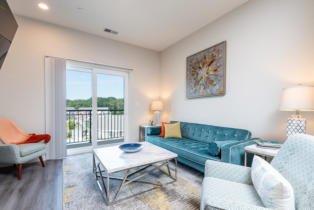 Millside living room model open floor plan balcony and wood finish flooring wide plank