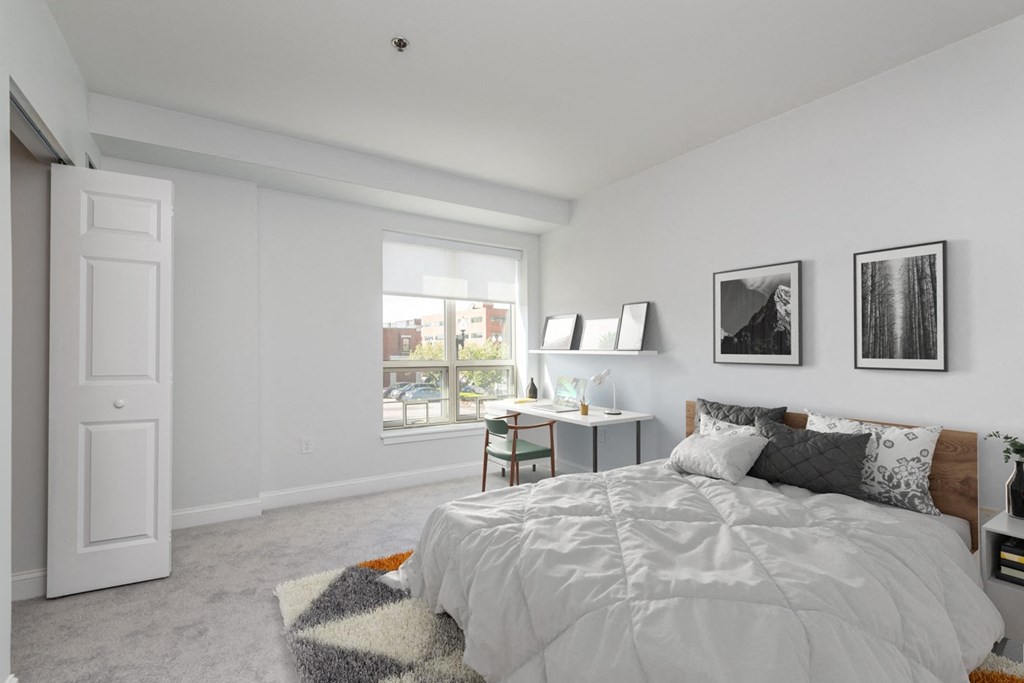 Bedroom view at Munroe Place in Quincy, MA- virtually staged