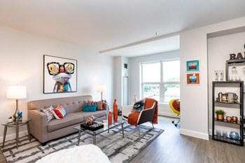 Spacious open-concept layouts in sun-filled apartments at Munroe Place in Quincy, MA