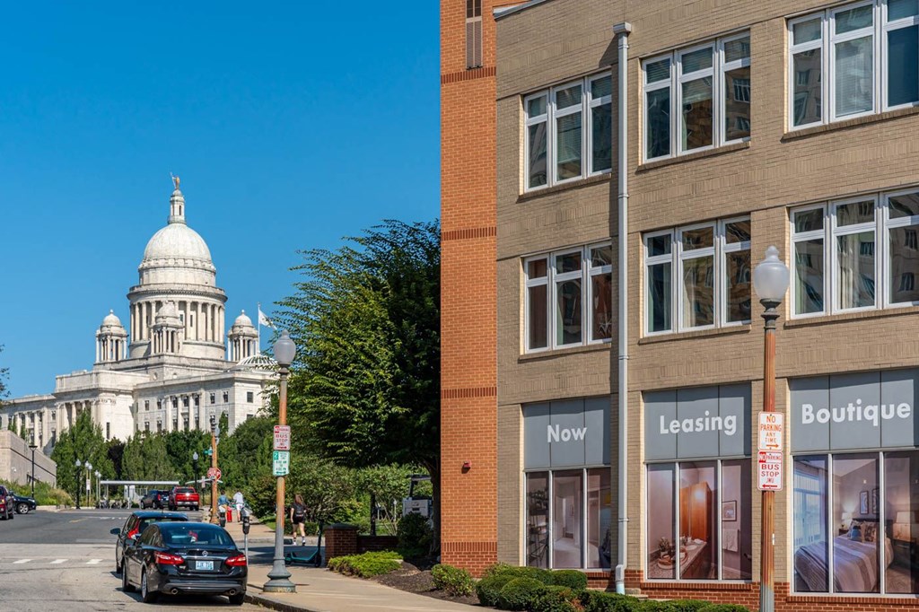 a city street with a building in the background