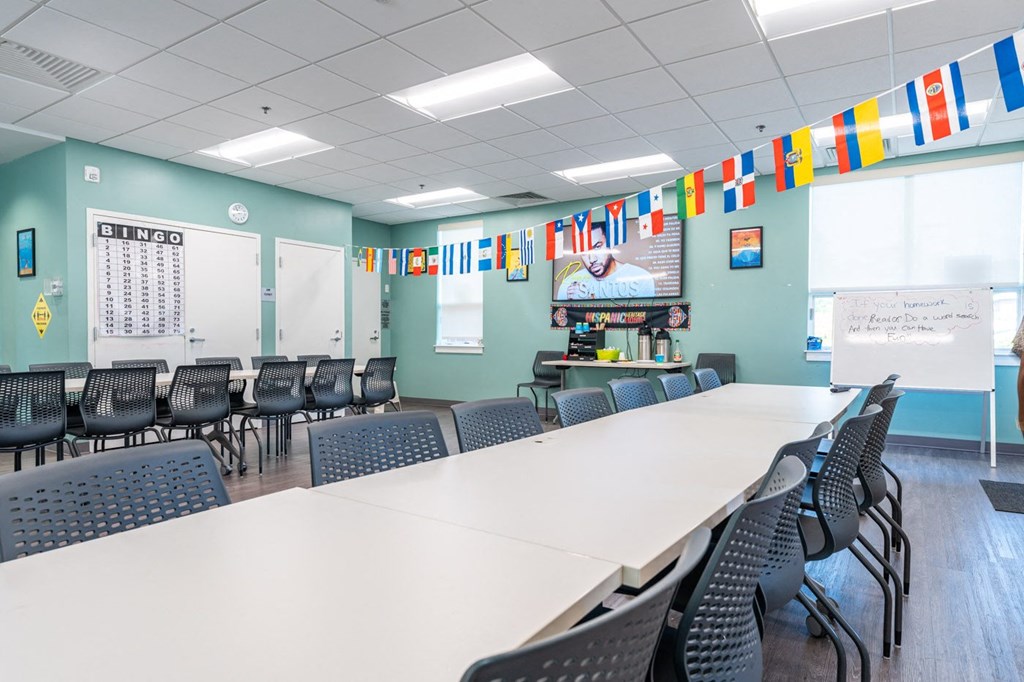 Lifelong learning center meeting room for resident events with table and chairs