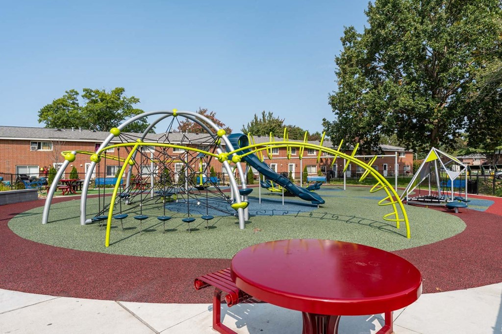 a playground at a school with a red table