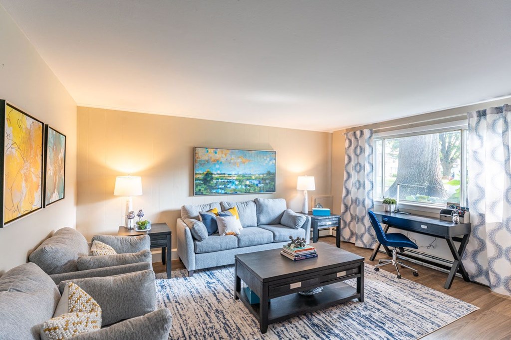 a living room with a couch and a table