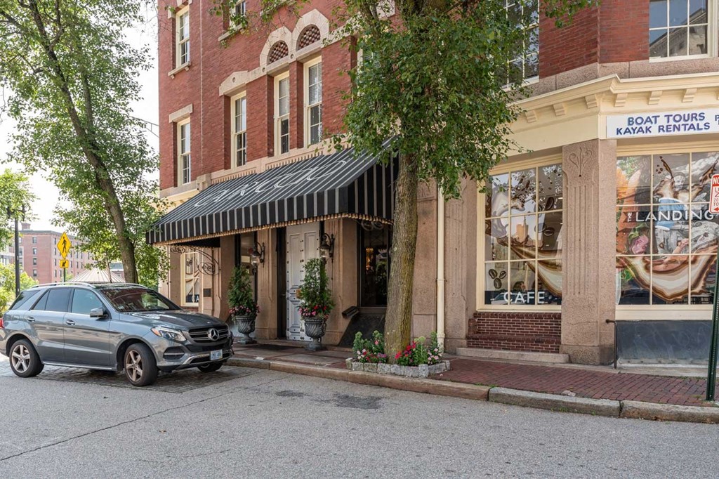 The storefront of a Cafe and boat rental building, kayak tours of providence