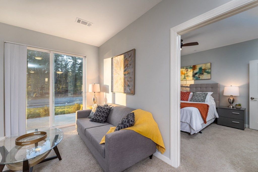 Redbrook two bedroom model apartment living space and patio