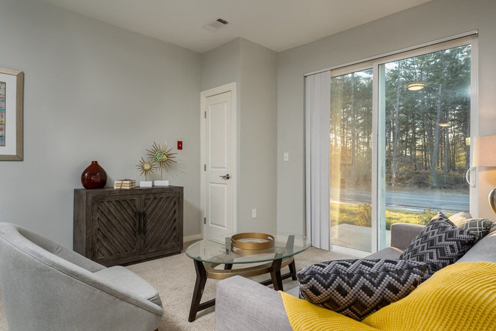 Redbrook two bedroom model apartment with large living space and patio