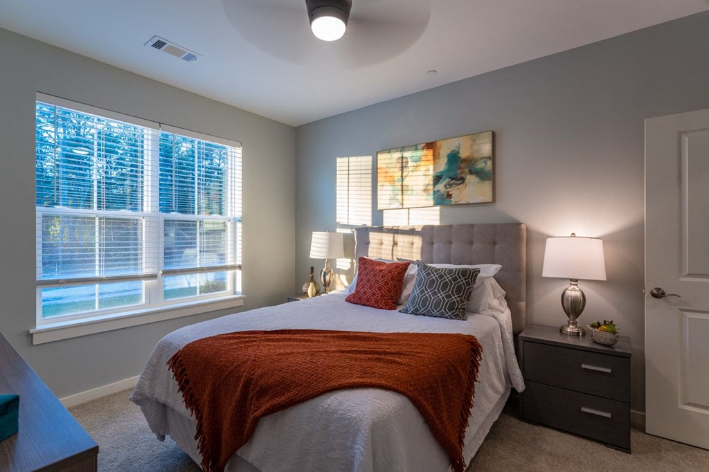 Redbrook model apartment two bedroom with large windo and ceiling fan