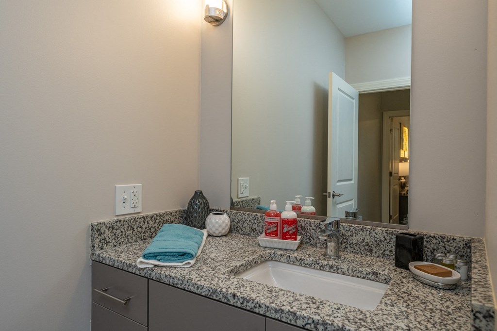 Redbrook two bedroom model bathroom with marble counters