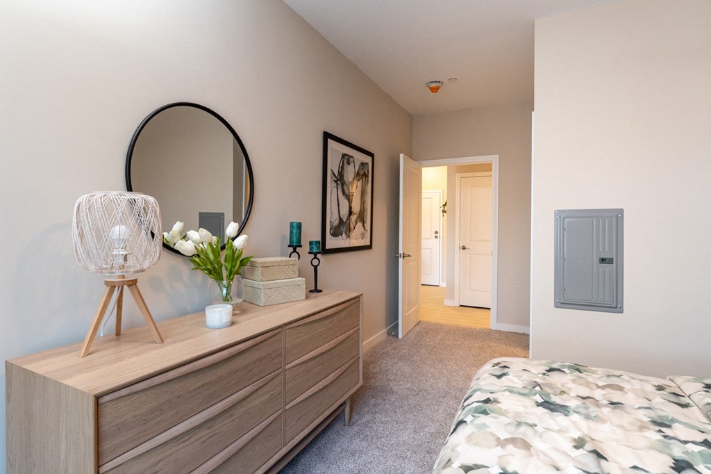 The Curtis Model Apartment Bedroom with plush carpeting