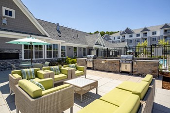 outdoor furniture overlooking pool deck & grills - Photo Gallery 8