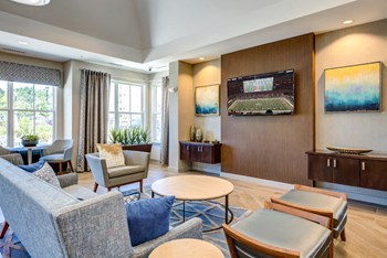 relax in our clubhouse watching complimentary TV Access - Photo Gallery 12