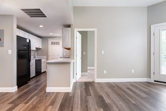 Open kitchen with white countertops