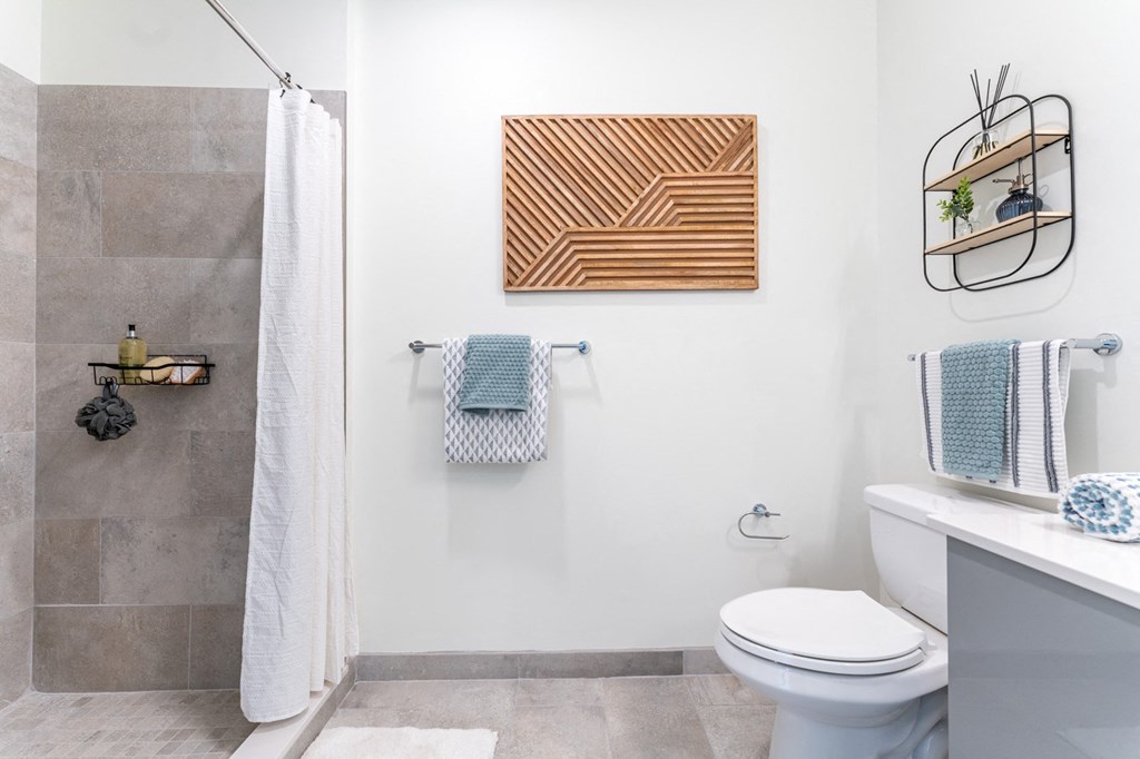 a bathroom with a shower and a toilet at Union 346 Apartments, Somerville