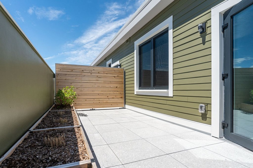the front porch of a house with a wooden fence  at Union 346, Somerville, MA 02143