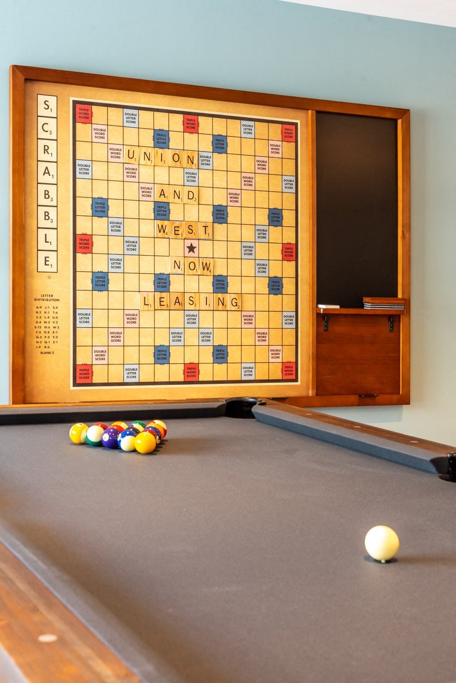 community room with pool table and scrabble board