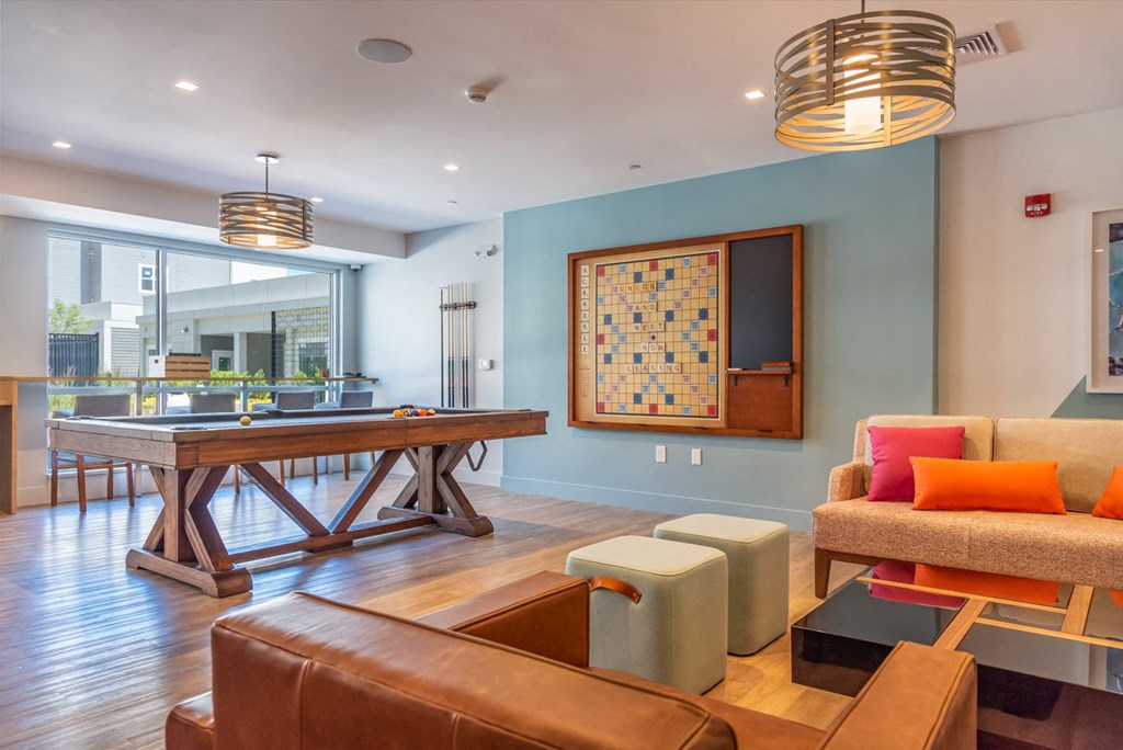 Union and west community room with fireplace games, lounge seating