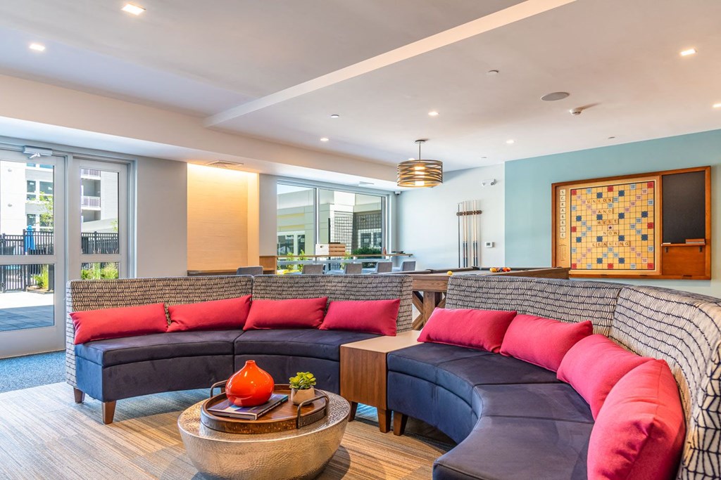 Union and west community room with fireplace games, lounge seating