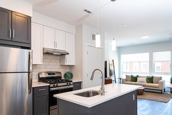 model apartment kitchen with stainless appliances - Photo Gallery 3