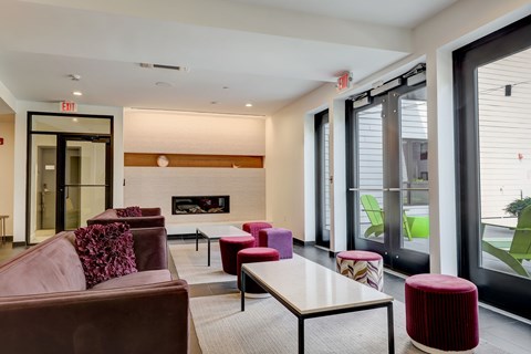 Clubhouse with lounge seating and a fireplace