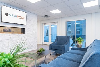 seating area of the community room at One Newport Quincy - Photo Gallery 5