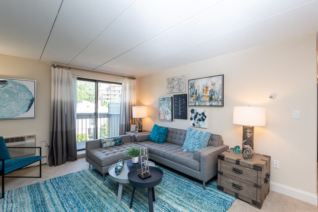 Faxon commons living room with balcony