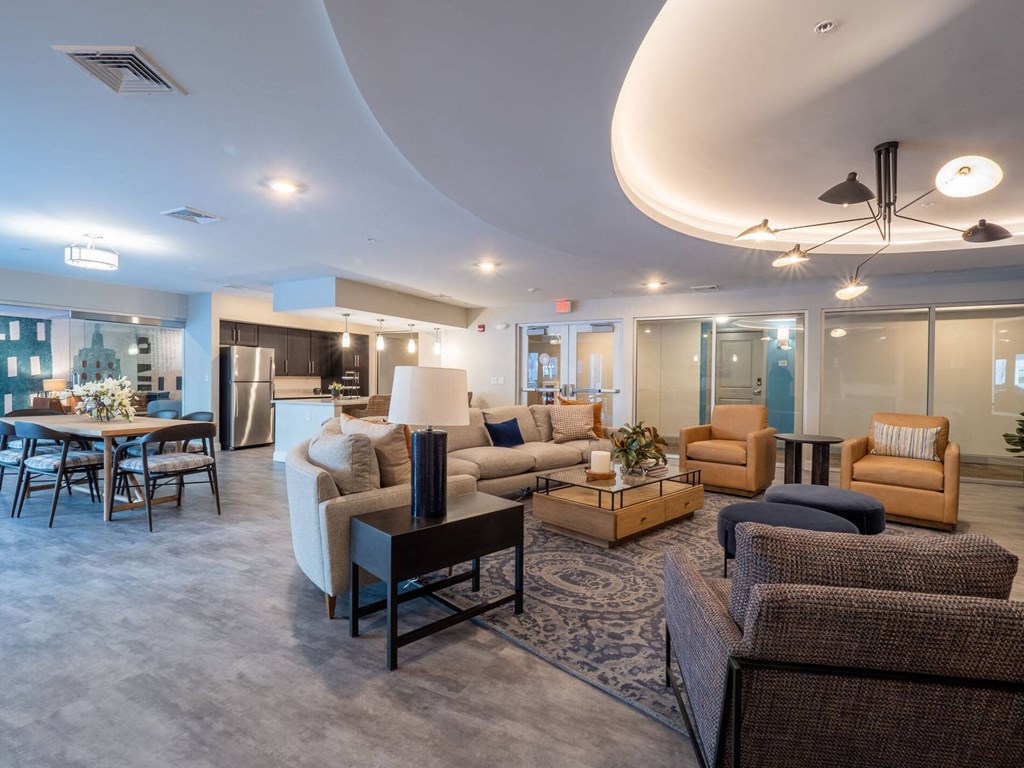 A well-appointed fitness center featuring free weights and strength training equipment.