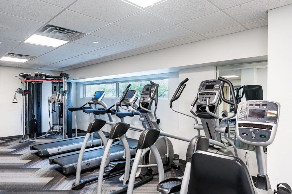 Fitness center with cardio and cable machine
