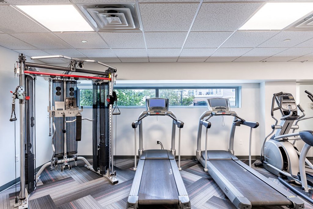 Fitness center with cardio and cable machine