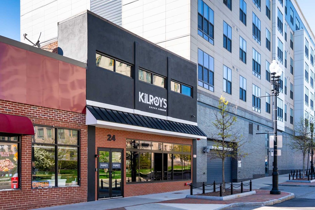 A Kilroy's storefront is shown with a red awning and a black sign.