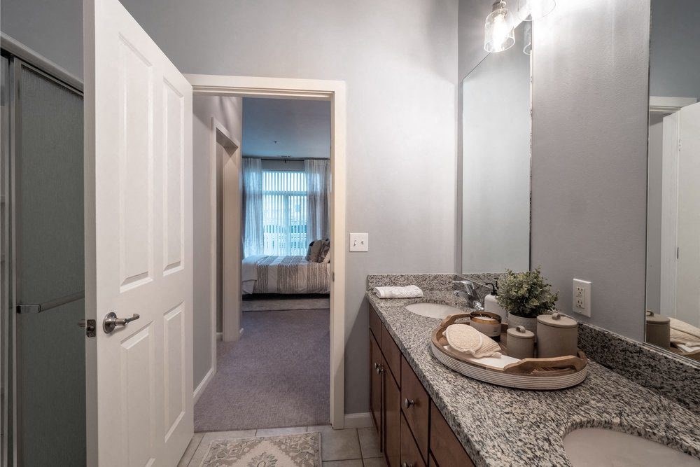 a bathroom with a sink and a mirror
