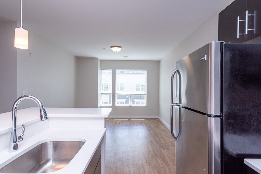 apartment kitchen and stainless steel refridgerator