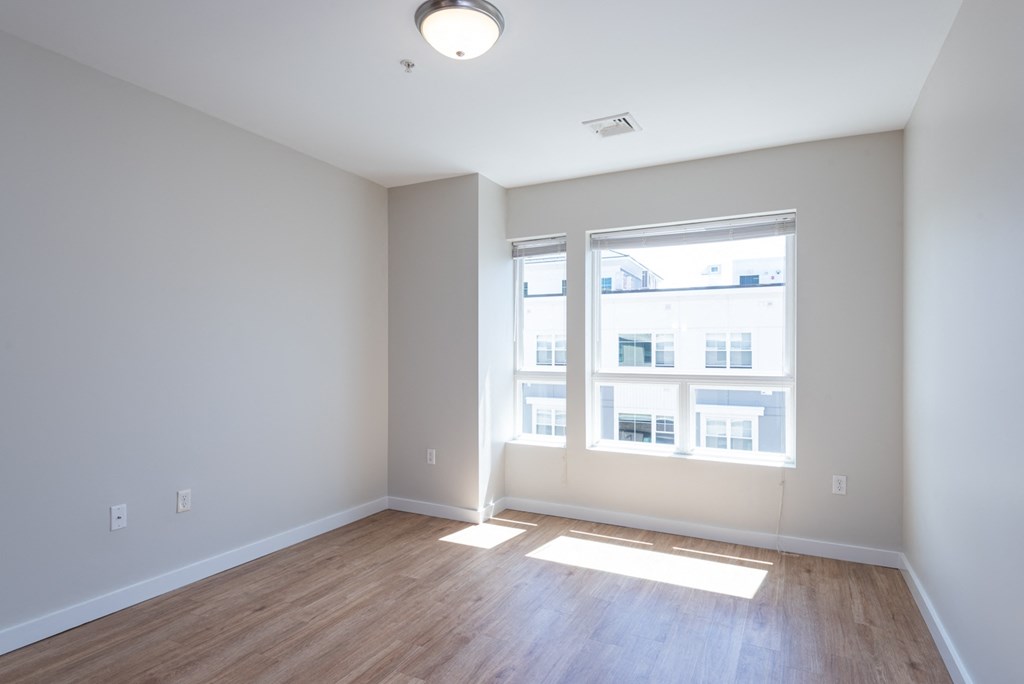 living space with wood vinyl flooring