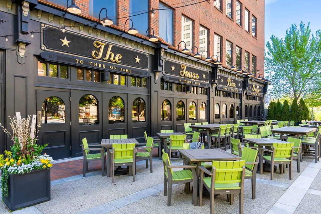 The restaurant has tables and chairs outside.