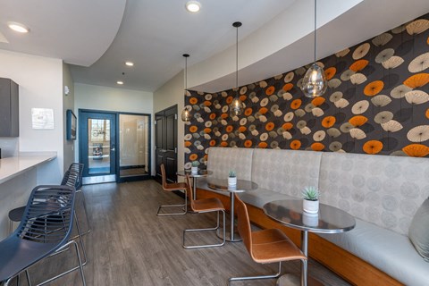Community lounge kitchen area with lounge cafe style seating and bartop seating