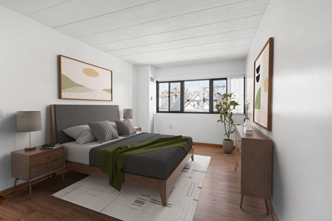 A bedroom with a bed, nightstand, and a painting on the wall.