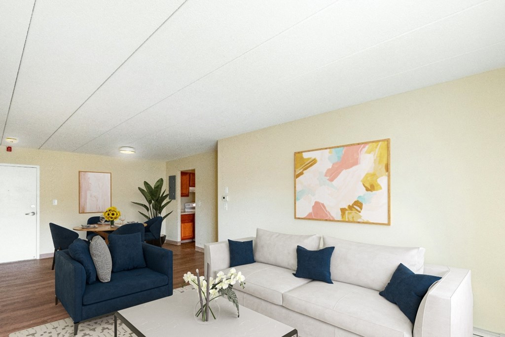 A living room with a blue couch and a white couch at Edmands House, Massachusetts, 01701