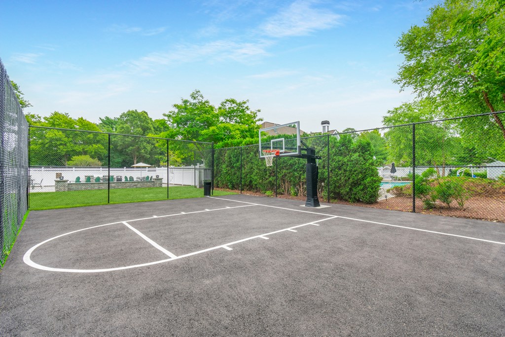 the basketball court at the estates apartments at Woodlands at Abington Station, Abington, MA