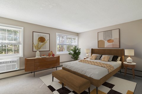 a bedroom with a bed and a dresser and two windows