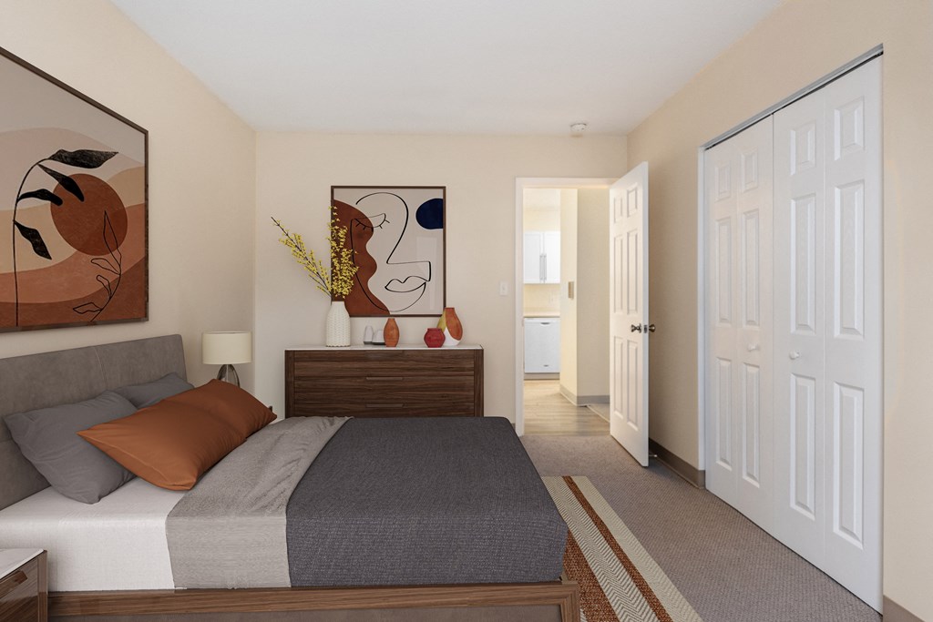 a bedroom with a bed and a dresser and a door to a bathroom at Blue Hills Village, Canton, 02021