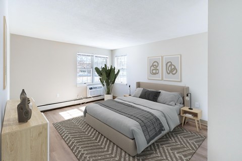 A bedroom with a large bed at Pondside at Littleton, Littleton, MA, 01460