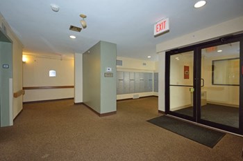 Entrance Way And Lobby At Sycamore Place Apartments. - Photo Gallery 4