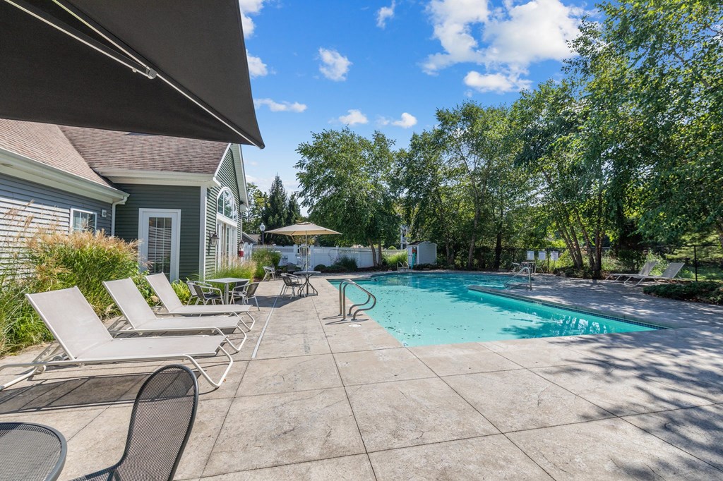 the pool at the whispering winds apartments in pearland, tx  at Woodlands at Abington Station, Abington, MA