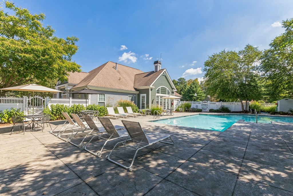 take a dip in the pool at the enclave at woodbridge apartments in sugar land, tx at Woodlands at Abington Station, Abington