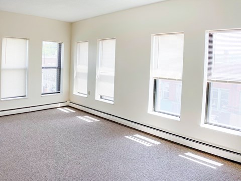 Open Bedroom Space With Large Windows Pequoig House Apartments Athol, MA.