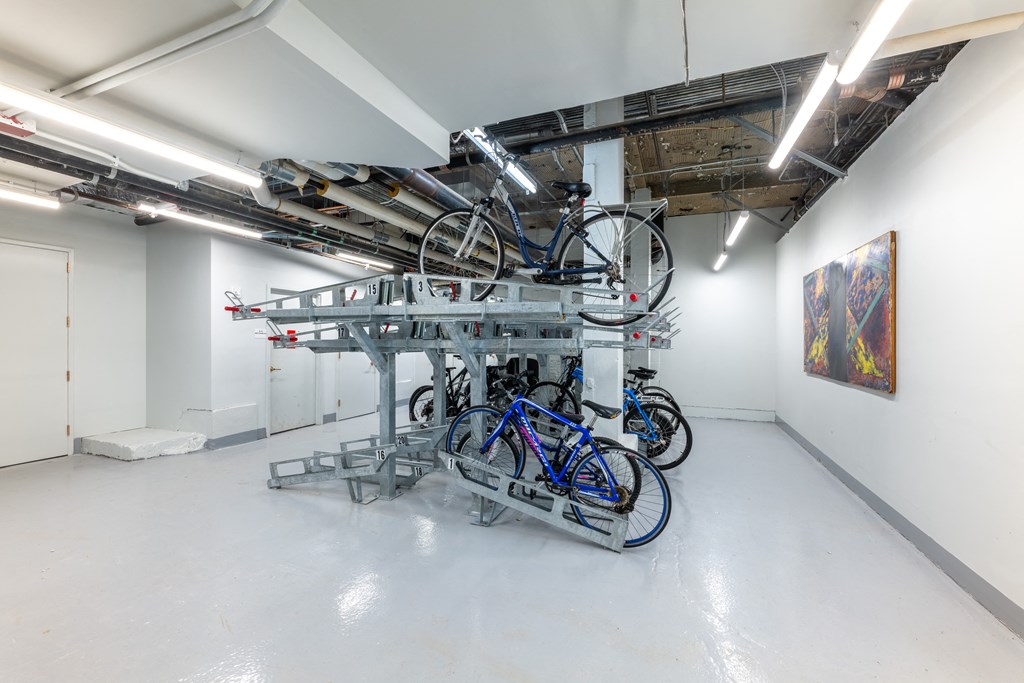 a group of bikes on a rack in a room  at 140 Clarendon, Boston, MA