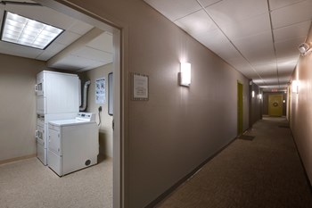 Interior Hallway Walkover Commons Apartments. - Photo Gallery 5